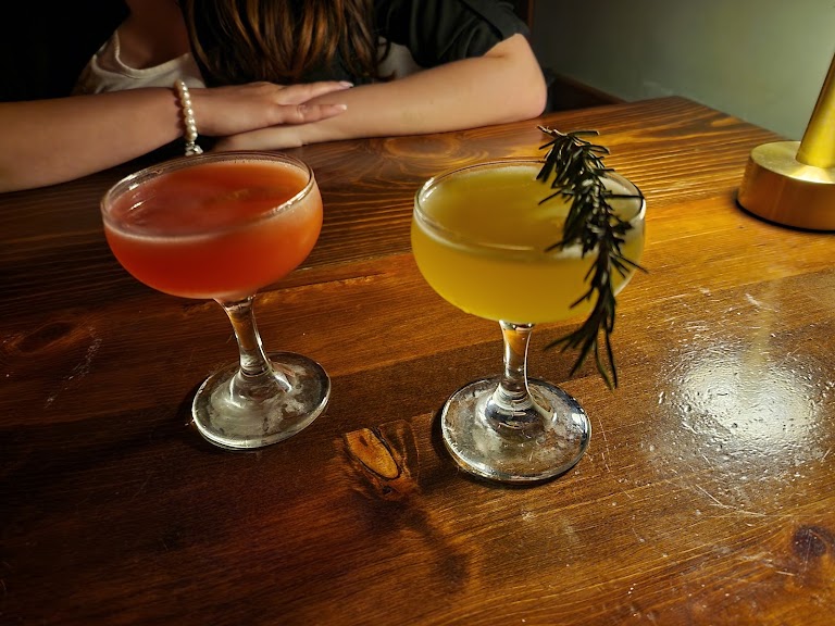 Cocktail with Black Cherry Garnish at Blue Collar