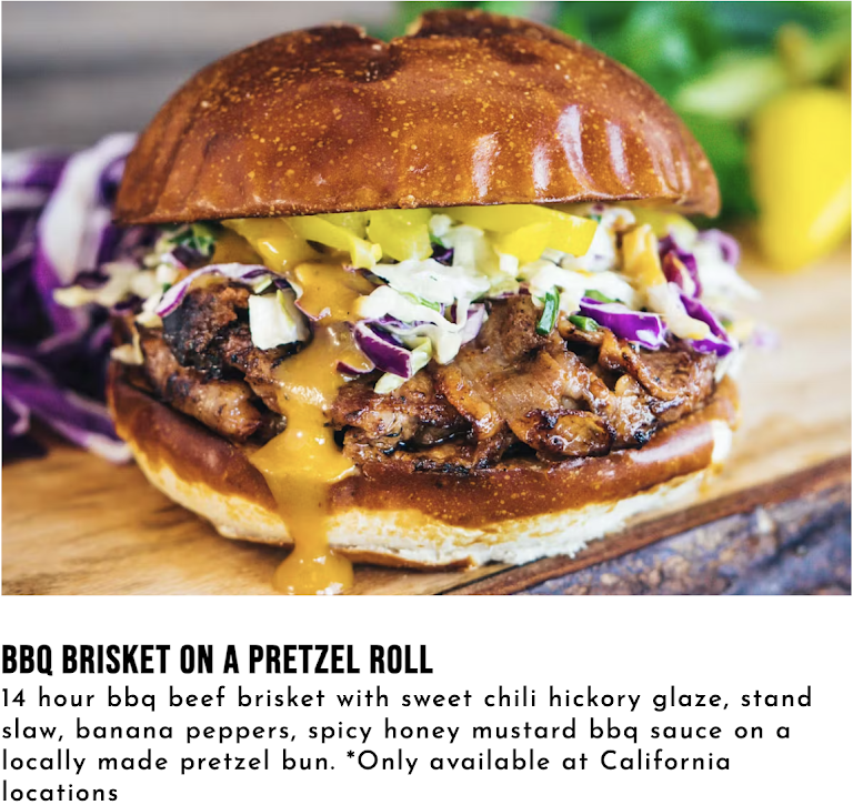 BBQ Brisket on a Pretzel Roll at The Stand - American Classics Redefined