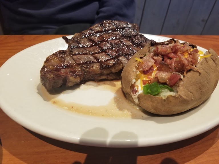 12 Oz. New York Strip with Grilled Shrimp and Hot Link Smoked Sausage at Black Angus Steakhouse