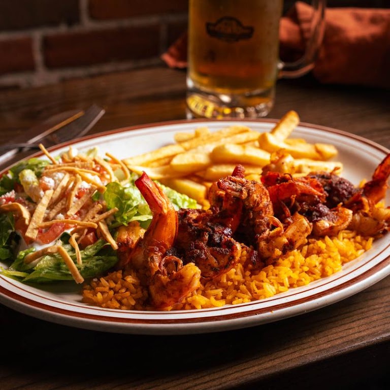 Asombroso at Los Tres Hermanos Bar and Grill