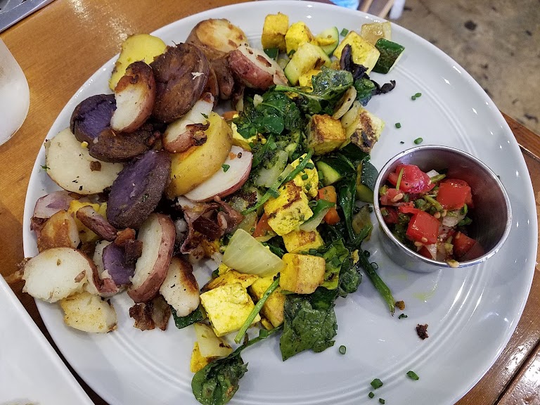 Broccolini and Artichoke Quiche with Mozzarella, Roasted Garlic, Rainbow Grape Tomato Bruschetta at Humble Bee Bakery & Cafe