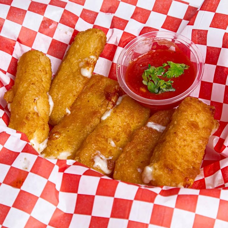 Mozzarella Sticks with Marinara Sauce at Desi Halal Pizza