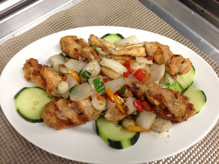 Frog Legs Stir Fried in Curry, Chili, Lemon Grass at Pho Century