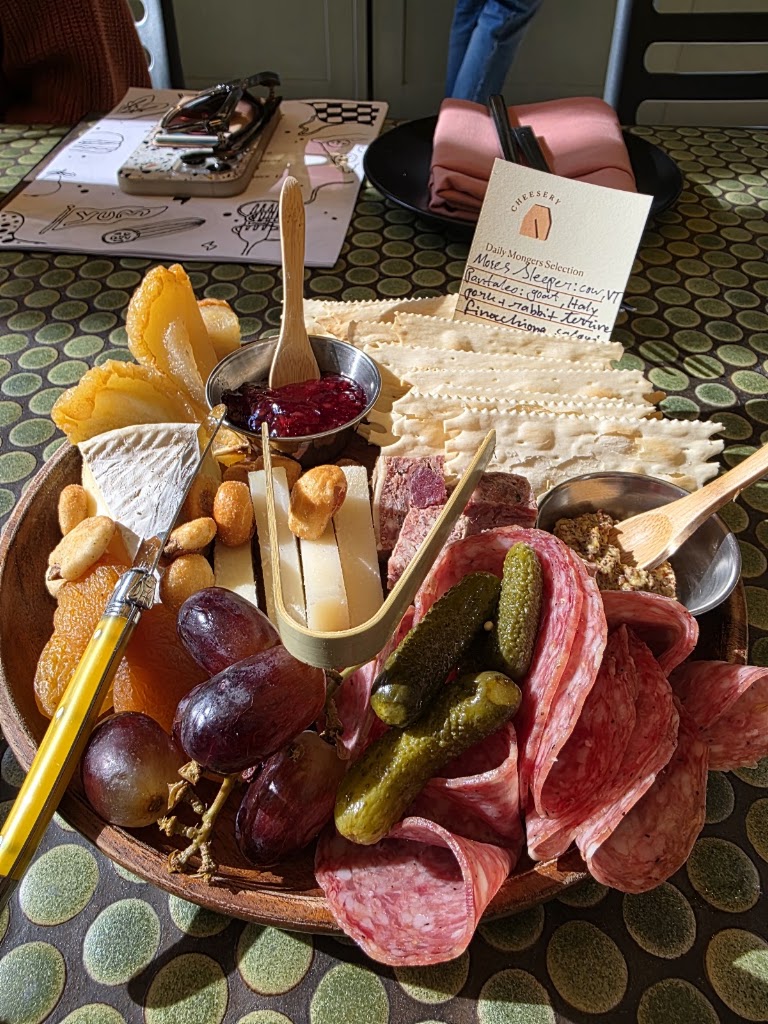 Assorted Artisanal Cheeses, Meats, and Accompaniments at Agnes Restaurant & Cheesery