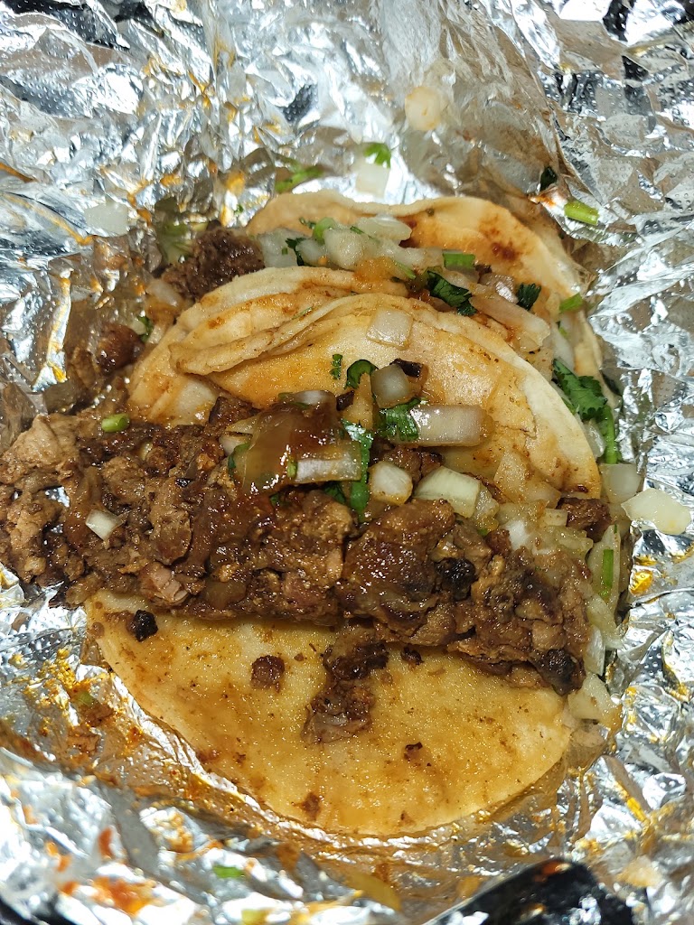 5 Tacos De Asada at El Taco Llama.