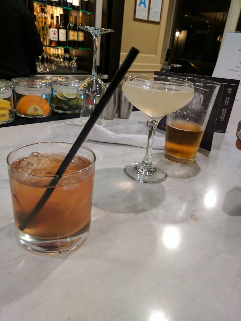Cocktail with Orange/brown Liquid at The Bistro - Eat. Drink. Connect.®