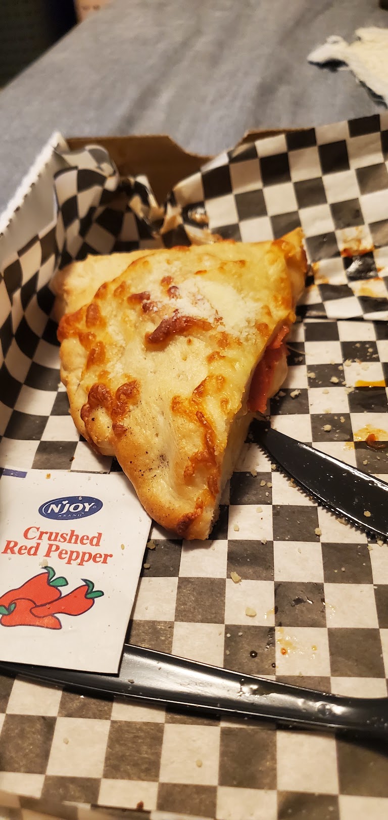 Jumbo Slice of Pizza at Oro's Pizza and Bakery