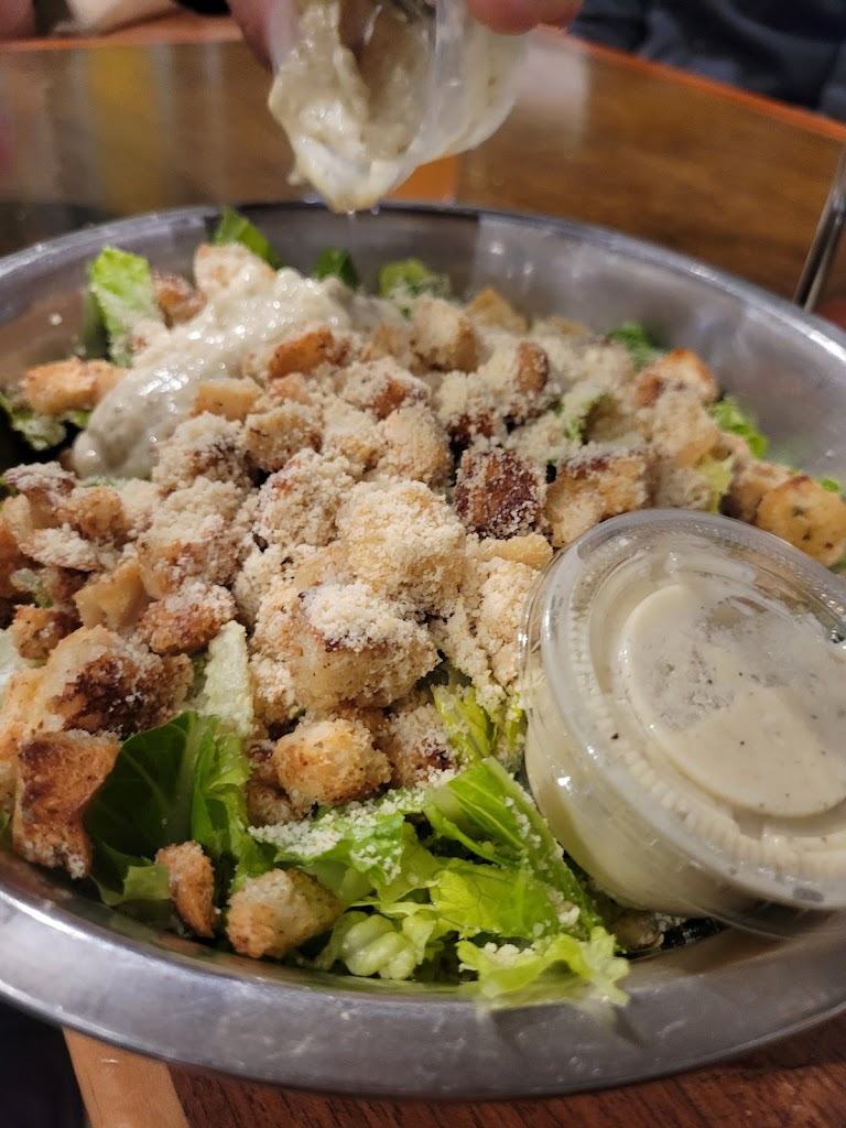 Caesar at Purgatory Pizza