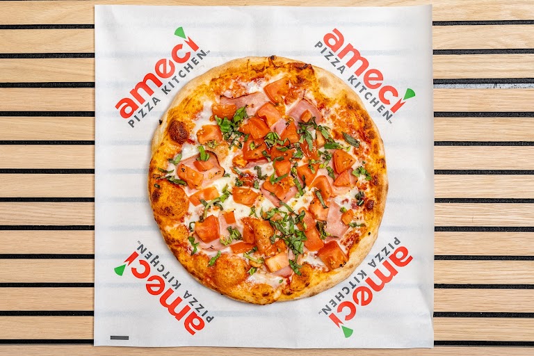 Large 14" Pizza with Two Free Toppings at Ameci Pizza & Pasta