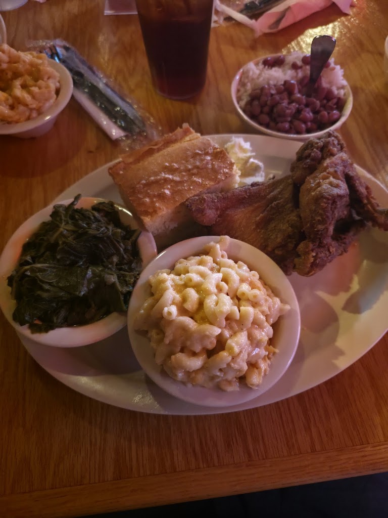 Thigh, Leg, Rice with Gravy & Biscuit at Roscoe's Chicken & Waffles