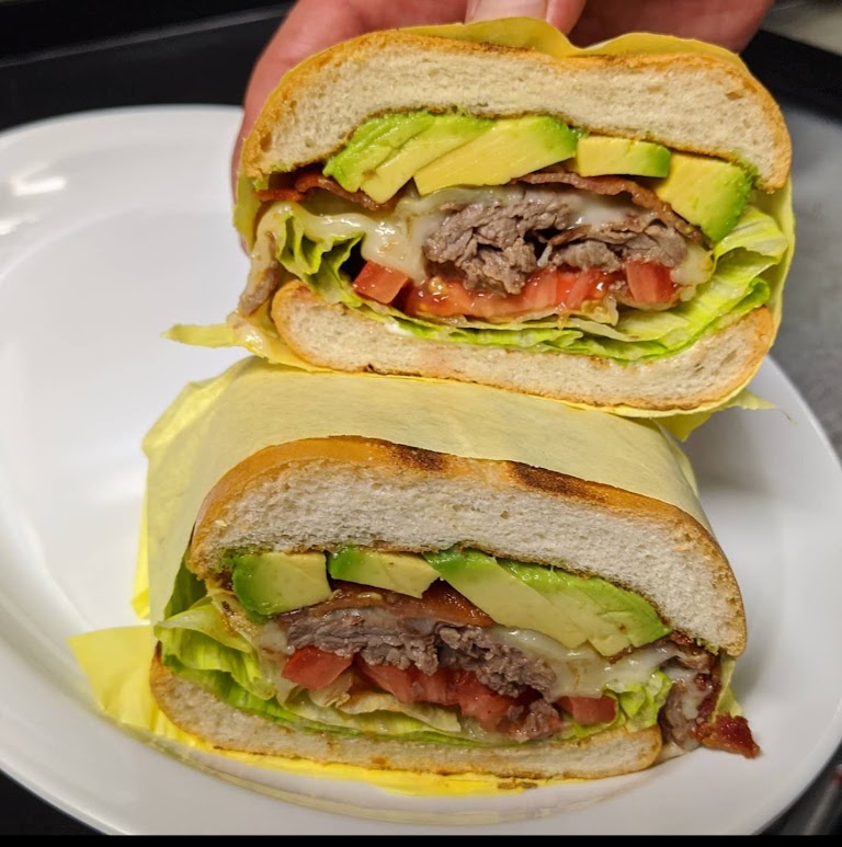 Breakfast Sandwich or Flaky Croissant at Beverliz Cafe