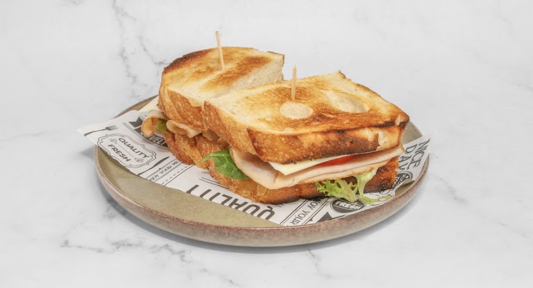 Bistros Turkey Club Sandwich at Bistró by Gretel & Company