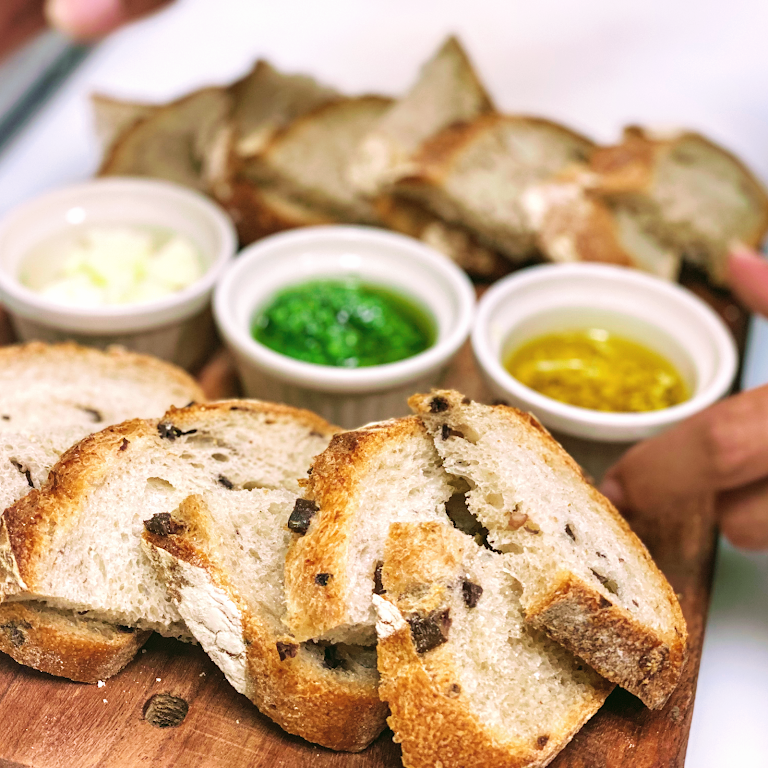 Assorted Bread Platter with Accompaniments at Barrio